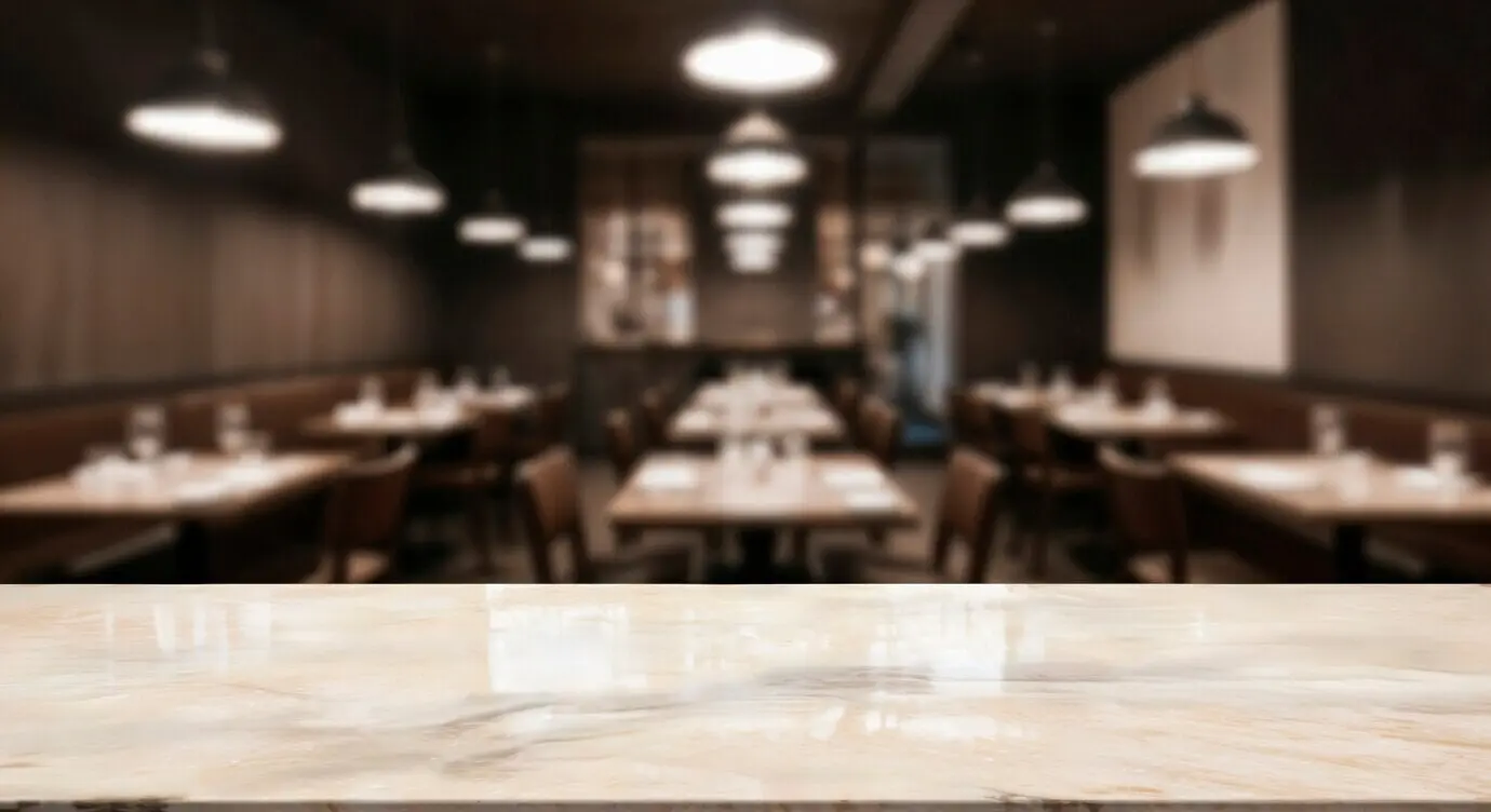 An unoccupied marble table in a restaurant